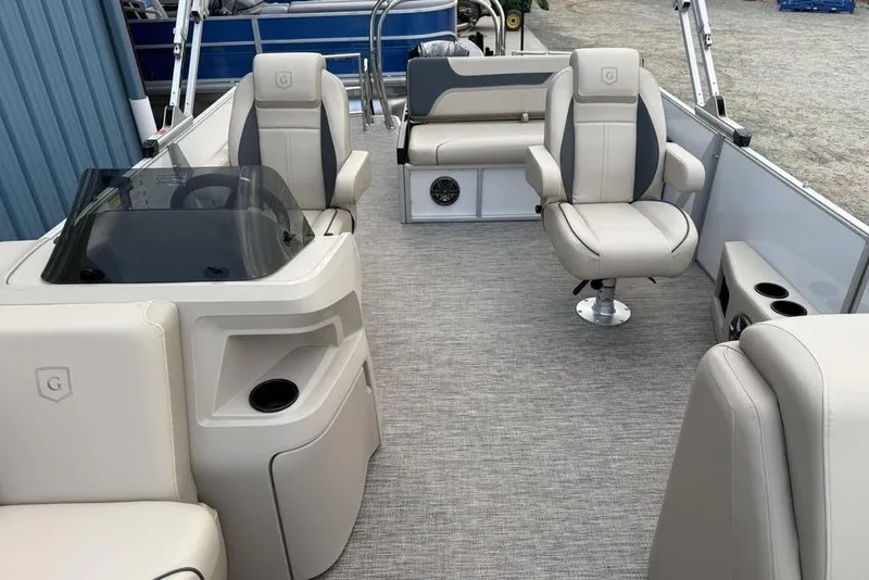 Slide: The Image of 2026 Godfrey Sweetwater 2286 SFLC boat interior with plush seating and modern design. - 13