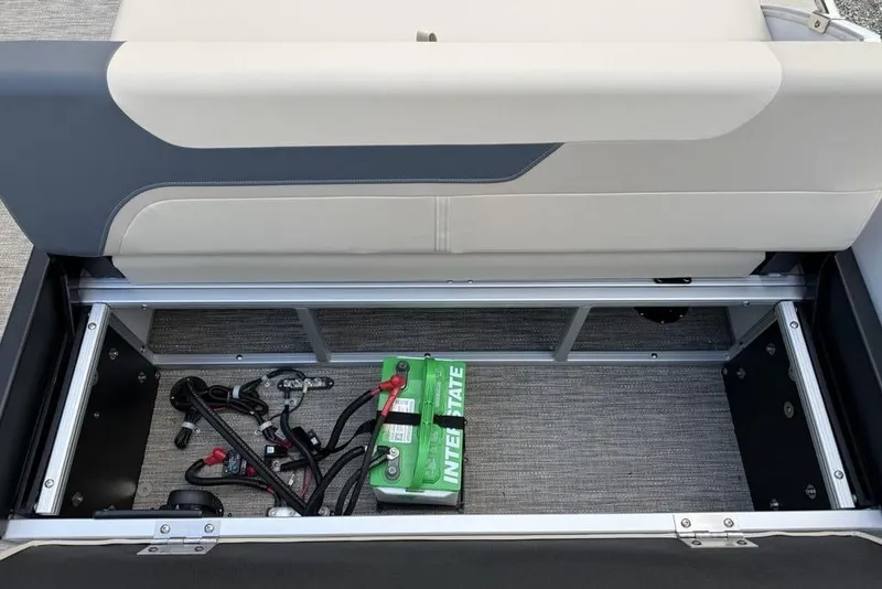 Slide: The Image of Under-seat storage with battery in 2026 Godfrey Sweetwater 2286 SFLC pontoon boat. - 17