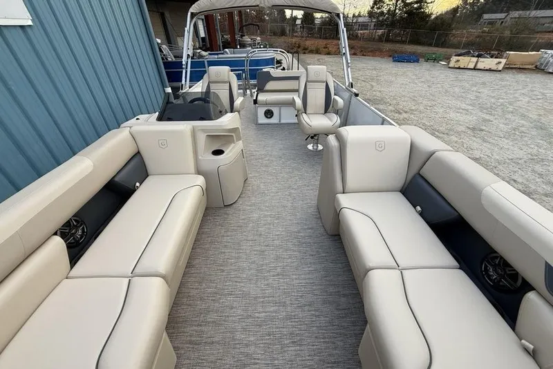 Slide: The Image of 2026 Godfrey Sweetwater 2286 SFLC pontoon boat with spacious seating and modern design. - 18