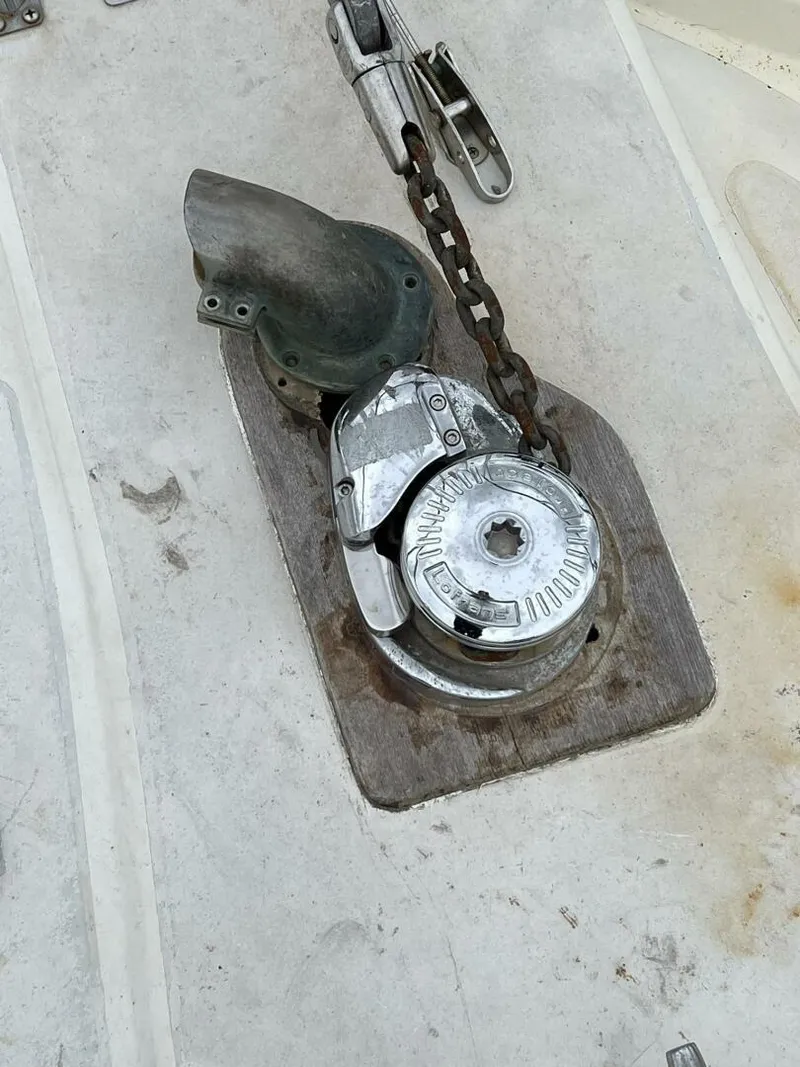 Slide: The Image of Anchor windlass on 1987 Californian 42 Motor Yacht deck. - 33