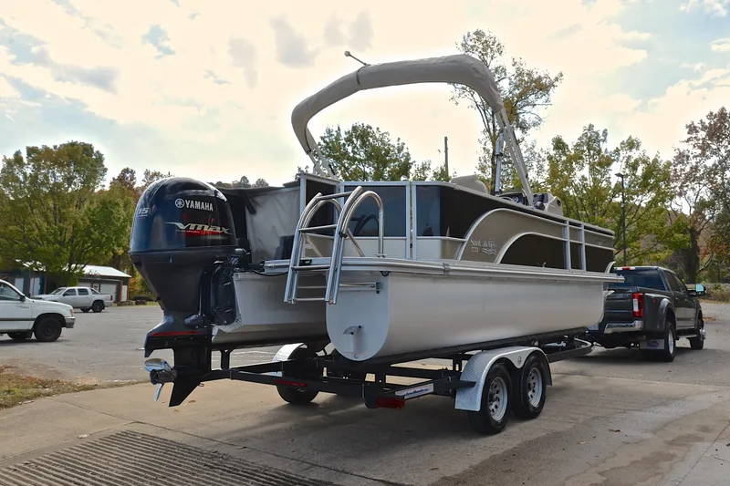 Slide: The Image of 2023 SunCatcher Select 22F pontoon boat on trailer, featuring Yamaha VMAX engine. - 14