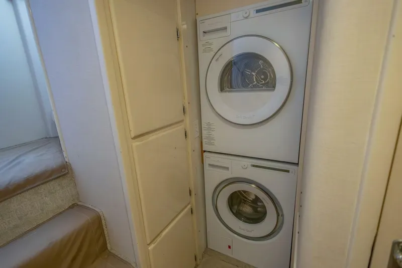 Slide: The Image of Stacked washer and dryer in 1987 Hatteras 70 Cockpit Motor Yacht interior. - 24
