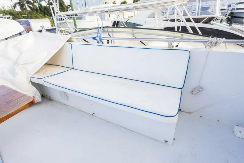 Slide: The Image of White seating area on 1987 Hatteras 70 Cockpit Motor Yacht deck. - 37