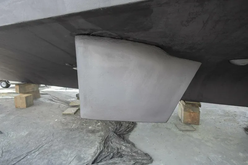 Slide: The Image of Close-up of 1987 Hatteras 70 Cockpit Motor Yacht hull detail on dry dock. - 51