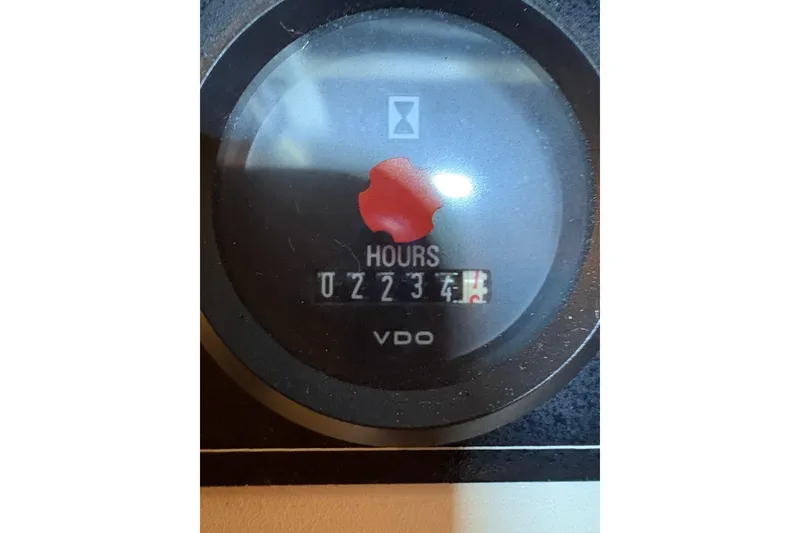 Slide: The Image of Hour meter reading 2234.6 on 1987 Hatteras 70 Cockpit Motor Yacht. - 53