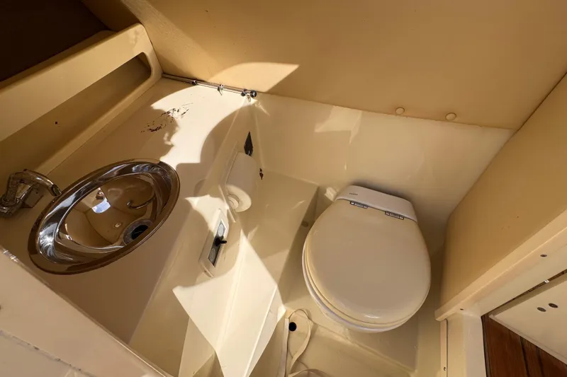 Slide: The Image of 2014 Chris-Craft Launch 28 boat bathroom with sink and toilet. - 20