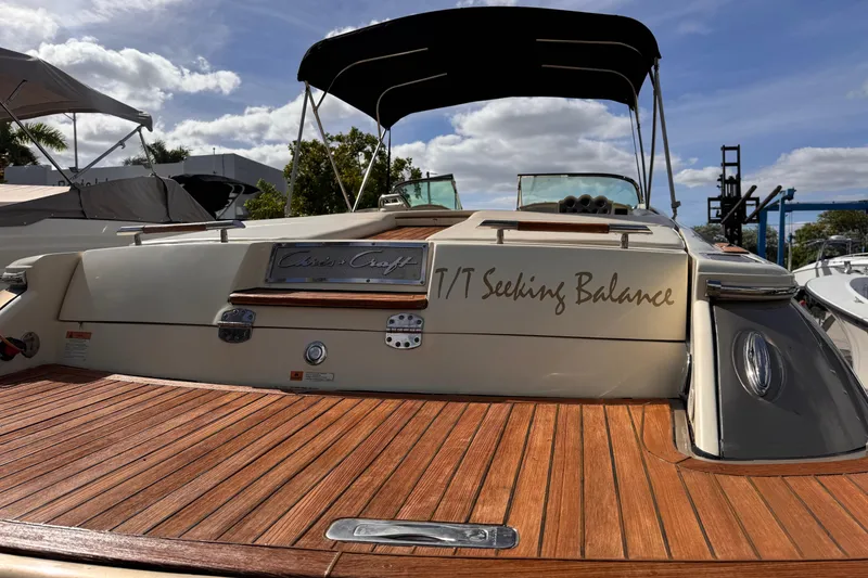 Slide: The Image of 2014 Chris-Craft Launch 28 boat with teak deck and custom name "Seeking Balance." - 5