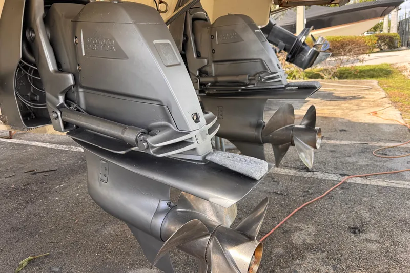 Slide: The Image of 2014 Chris-Craft Launch 28 with Volvo Penta outdrives, parked on concrete. - 7