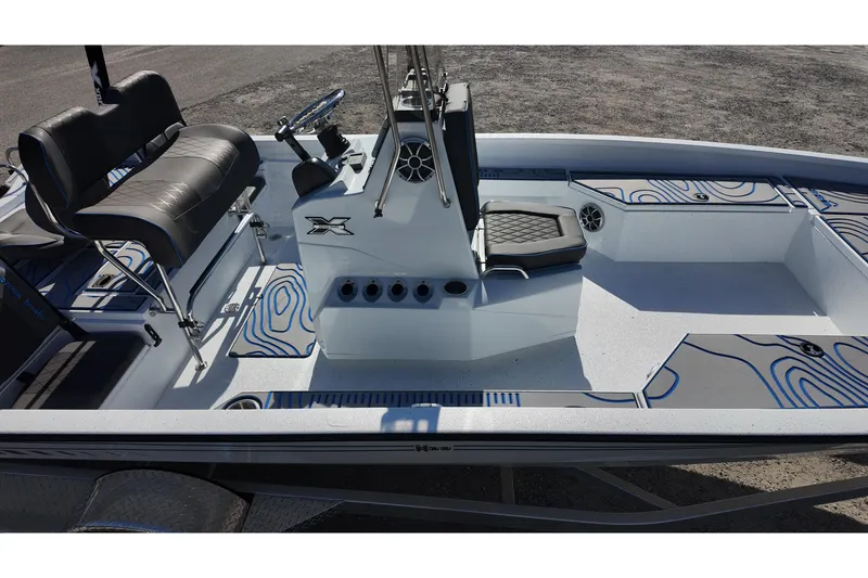 Slide: The Image of 2026 Xpress H22B Bay boat interior with sleek seating and modern design. - 17