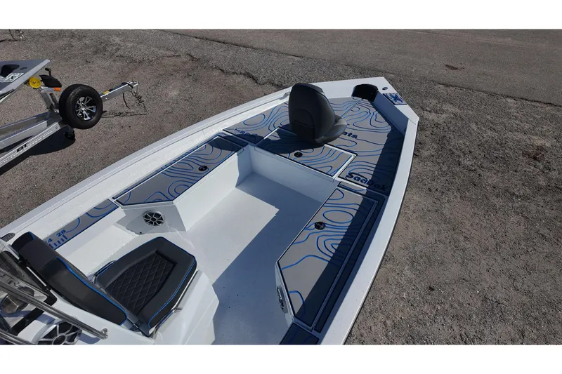 Slide: The Image of 2026 Xpress H22B Bay boat interior with stylish seating and storage compartments. - 7