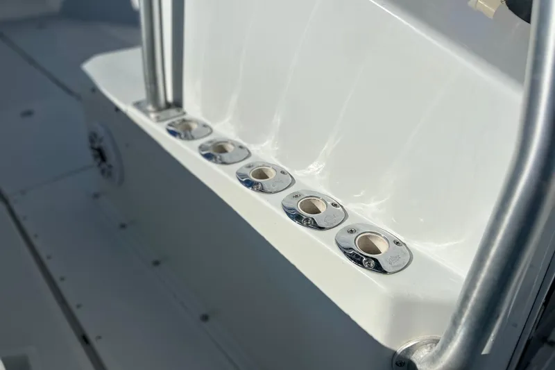 Slide: The Image of 1991 Contender 25 Open boat rod holders and seating detail. - 9