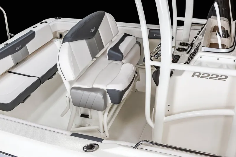 Slide: The Image of Manufacturer Provided Image: 2025 Robalo R222 Explorer boat interior with cushioned seating and sleek design. - 9