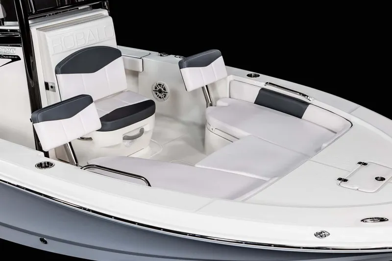 Slide: The Image of 2026 Robalo 226 Cayman boat dashboard with Garmin navigation system and Yamaha controls. - 9
