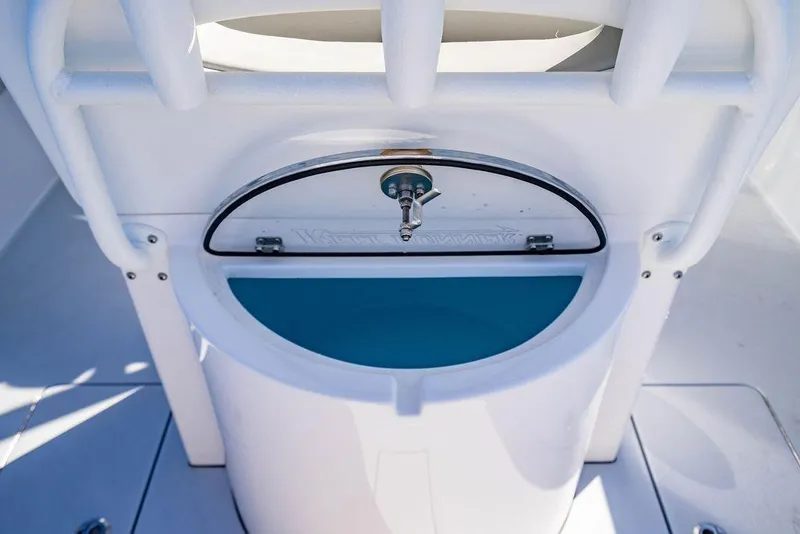 Slide: The Image of Reef Runner 230 boat on open sea, 2026 model. - 36