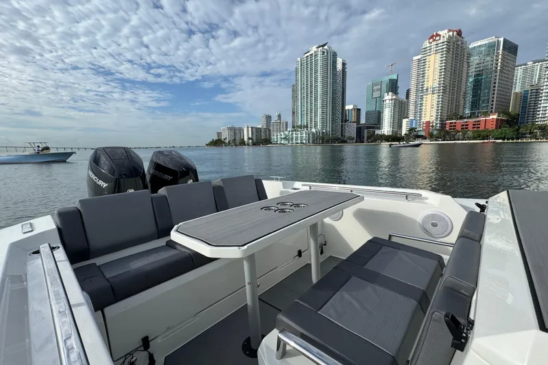 Slide: The Image of Luxury Northstar ORION 10 boat interior with city skyline view, 2026 model. - 16