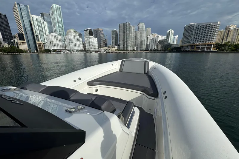 Slide: The Image of Northstar ORION 10 boat cruising near city skyline, 2026 model. - 17