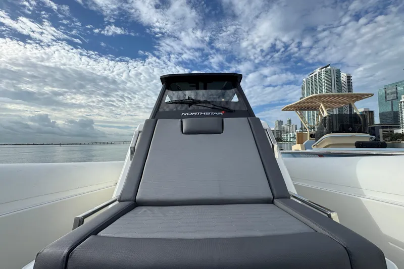 Slide: The Image of 2026 Northstar ORION 10 boat with city skyline and cloudy sky backdrop. - 20