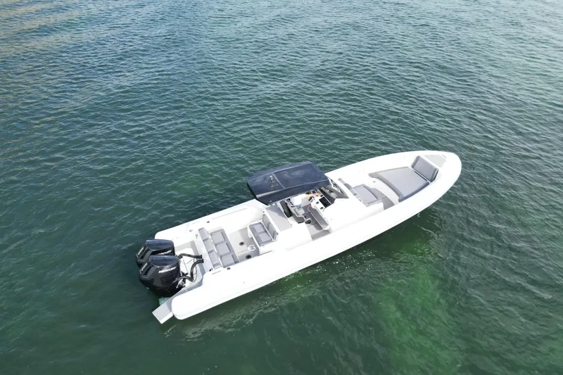 Slide: The Image of Aerial view of 2026 Northstar ORION 10 boat on calm water. - 3