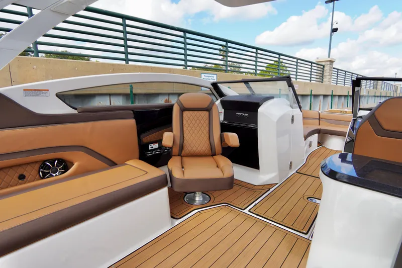 Slide: The Image of 2025 Yamaha Boats 275SD interior with luxurious seating and modern design. - 21