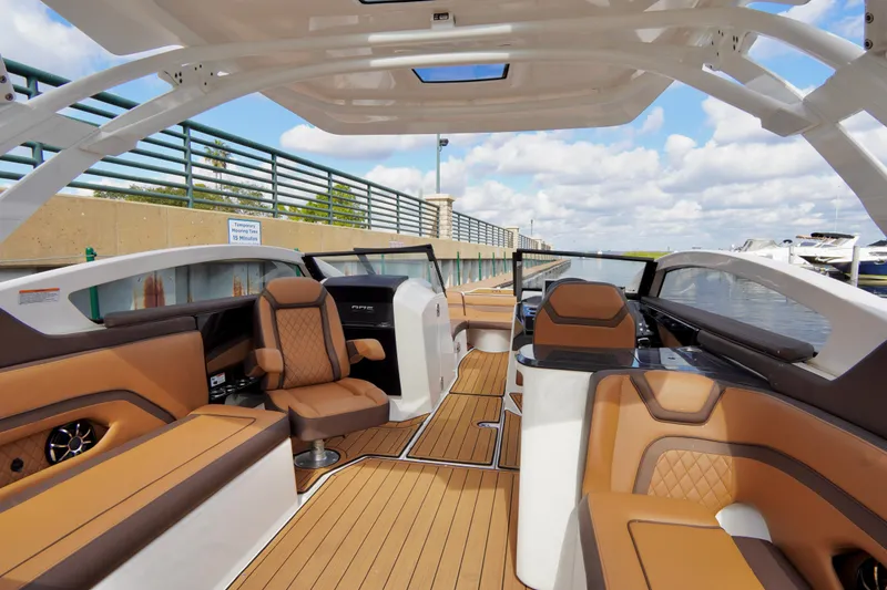 Slide: The Image of Luxurious interior of 2025 Yamaha Boats 275SD with elegant seating and modern design. - 22