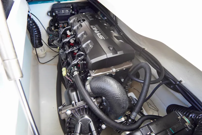 Slide: The Image of Engine compartment of 2025 Yamaha Boats 275SD, showcasing advanced marine engine components. - 34