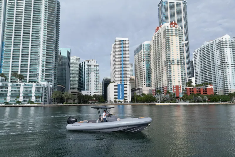 Slide: The Image of Boat cruising near city skyscrapers, Northstar Orion 8, 2026 model. - 6