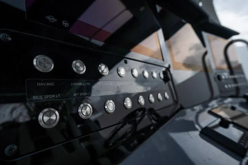 Slide: The Image of 2023 Tidewater 380 CC Adventure boat deck with foldable bench seat and storage. - 21