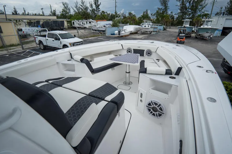 Slide: The Image of 2023 Tidewater 380 CC Adventure boat interior with Simrad electronics. - 34