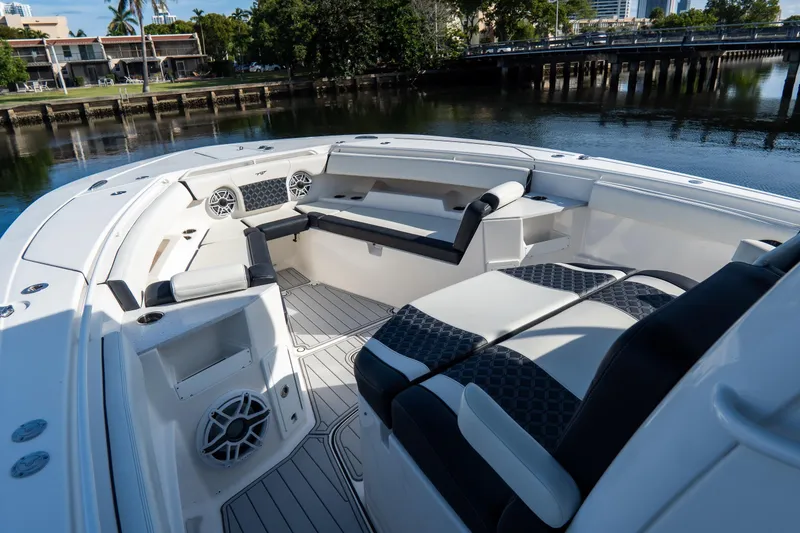 Slide: The Image of 2023 Tidewater 380 CC Adventure boat interior with luxurious seating and modern design. - 64