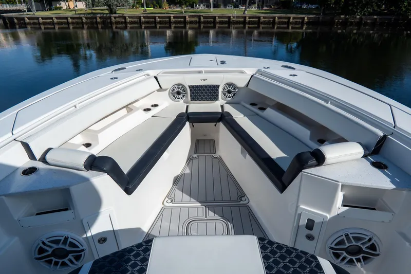 Slide: The Image of 2023 Tidewater 380 CC Adventure boat interior with spacious seating and modern design. - 66