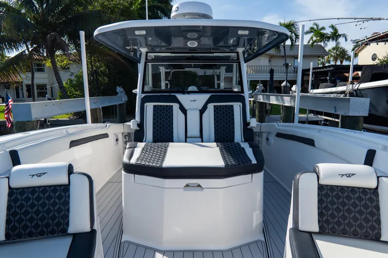 Slide: The Image of 2023 Tidewater 380 CC Adventure boat interior with luxurious seating and modern design. - 70