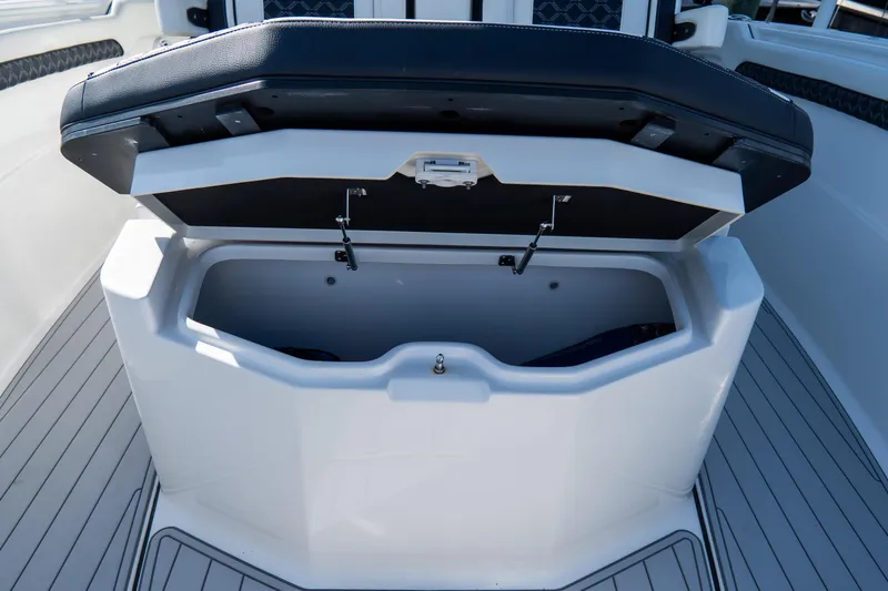 Slide: The Image of Open storage compartment on 2023 Tidewater 380 CC Adventure boat deck. - 71