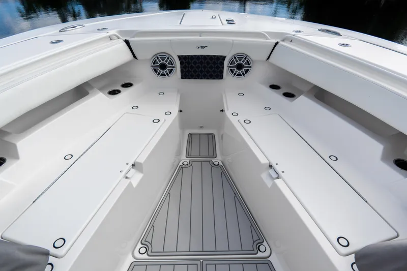 Slide: The Image of 2023 Tidewater 380 CC Adventure boat interior with spacious seating and modern design. - 73