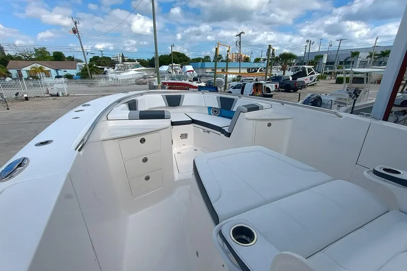 Slide: The Image of 2026 Robalo R360 Center Console boat interior with seating and storage compartments. - 25