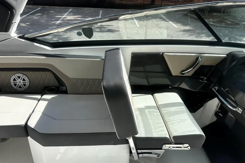 Slide: The Image of 2023 Monterey 305SS Super Sport boat interior with luxurious seating and modern design. - 16