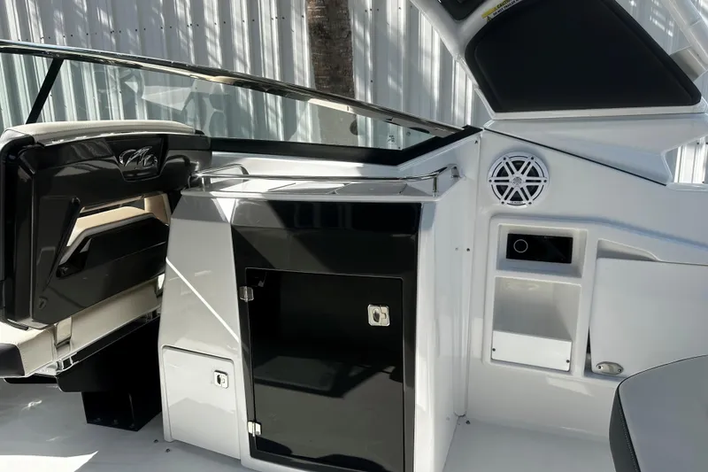 Slide: The Image of 2023 Monterey 305SS Super Sport boat interior with sleek design and modern features. - 18