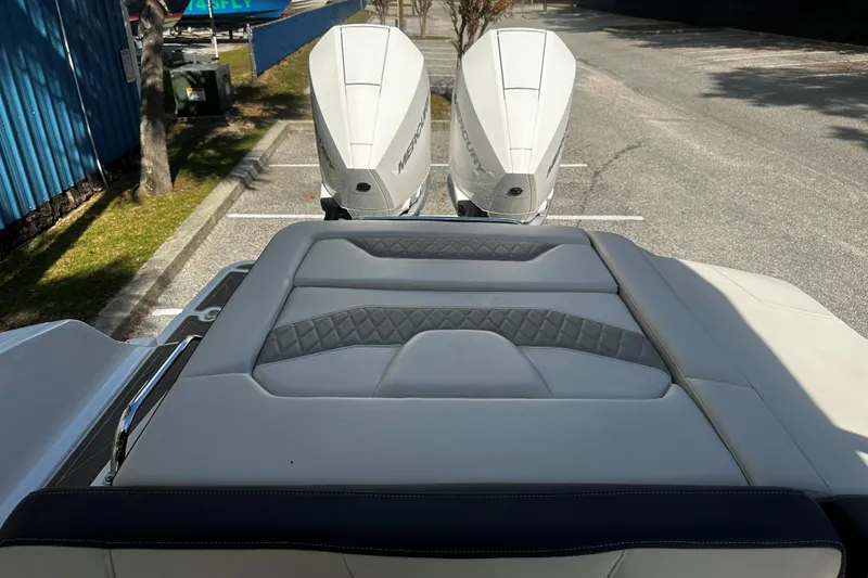 Slide: The Image of 2023 Monterey 305SS Super Sport boat with dual Mercury outboard engines. - 8