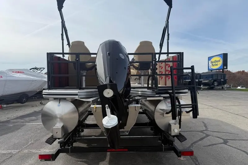 Slide: The Image of 2026 Lowe LF 214 pontoon boat with outboard motor at Blackbeard Marine dealership. - 6
