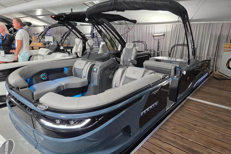 Slide: The Image of 2026 Godfrey SA boat with luxurious seating and modern design on display. - 1
