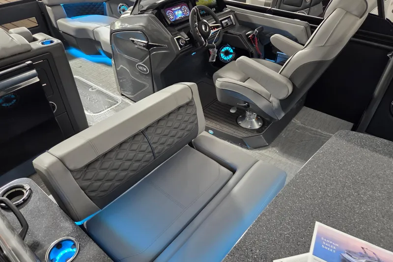 Slide: The Image of Luxurious interior of 2026 Godfrey SA boat with modern seating and illuminated features. - 5