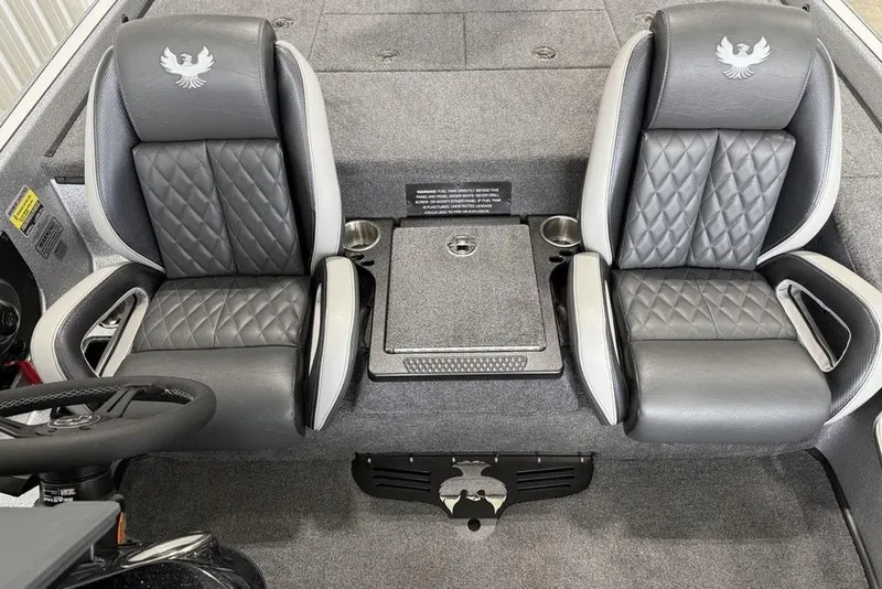 Slide: The Image of 2025 Phoenix 920 Elite II boat interior with dual gray leather seats and diamond stitching. - 14