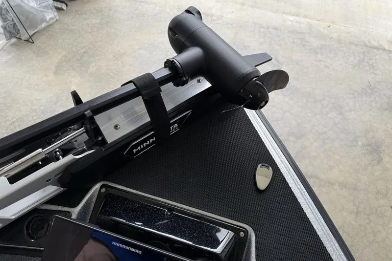 Slide: The Image of Trolling motor on a 2025 Phoenix 920 Elite II boat deck. - 6