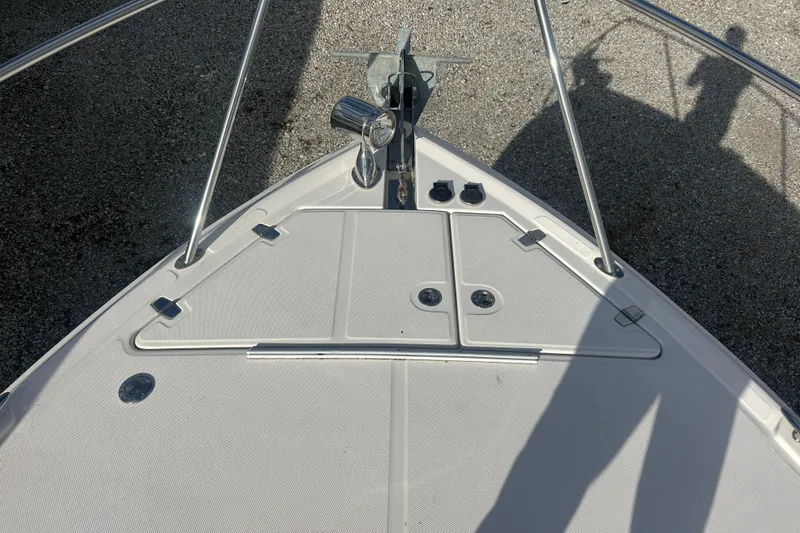 Slide: The Image of Bow of 2007 Regal 3060 Express Cruiser with anchor and railings. - 5