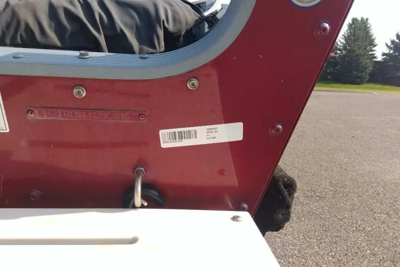 Slide: The Image of 2015 G3 Guide V177 WT boat detail with red exterior and visible barcode. - 11