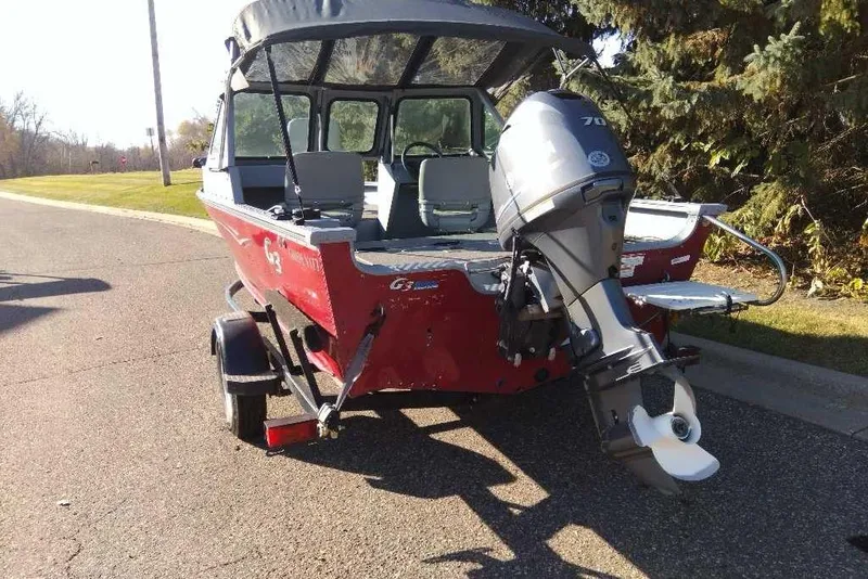 Slide: The Image of 2015 G3 Guide V177 WT boat with outboard motor on a trailer. - 4