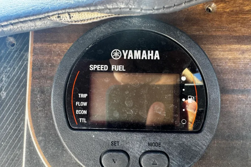 Slide: The Image of Yamaha speed and fuel gauge on 2019 Hurricane SunDeck 2690 OB boat dashboard. - 6