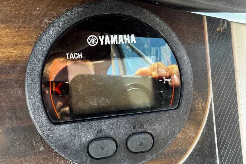 Slide: The Image of Yamaha tachometer on 2019 Hurricane SunDeck 2690 OB boat dashboard. - 7