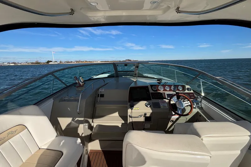 Slide: The Image of Interior view of 2010 Sea Ray 370 Sundancer yacht on open water. - 25