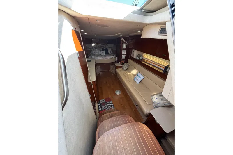 Slide: The Image of Interior of 2010 Sea Ray 370 Sundancer yacht with cozy seating and elegant decor. - 27