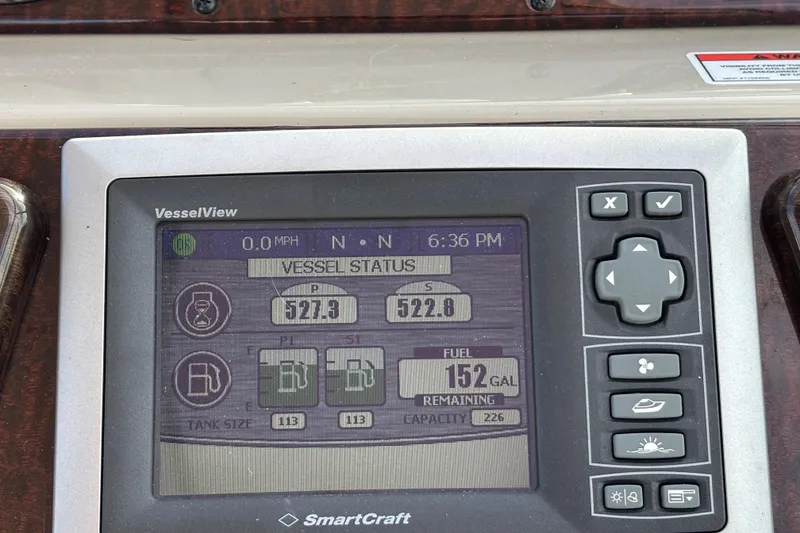 Slide: The Image of SmartCraft VesselView display on 2010 Sea Ray 370 Sundancer showing vessel status and fuel levels. - 42